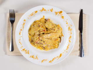 Saucy Prepared Dish Served in White Bowl