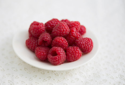 raspberry on the white plate
