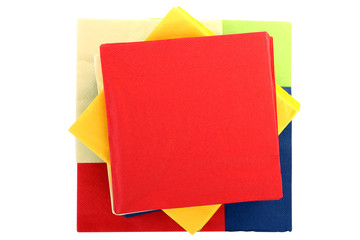 Serving colored paper napkins isolated on white background