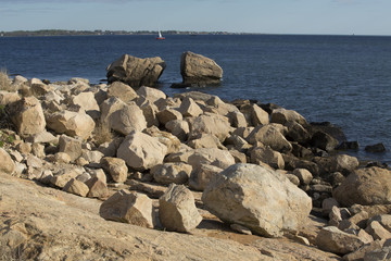 Boulders on the beach along southern coast of Connecticut.