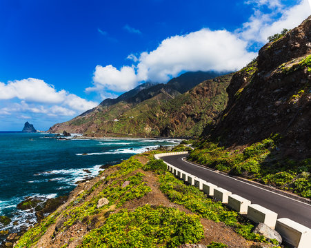 Fototapeta Asphalt road near coast of Atlantic ocean