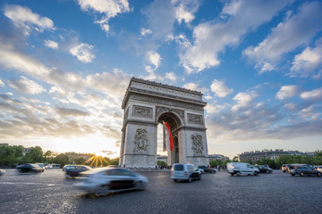 Arc de Triomphe and blurred traffic at sunset