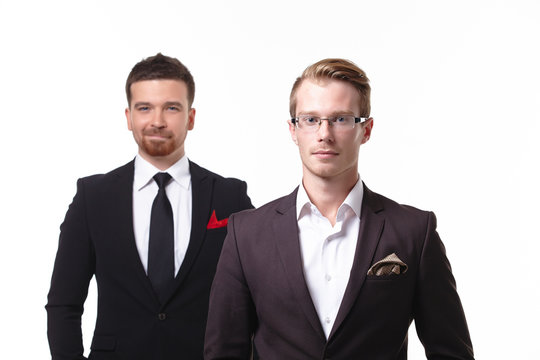 Close-up Portrait Of Two Young Businessmen