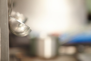 ladles hanging in the kitchen