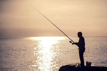 Man fishing at the morning.
