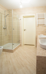 Fototapeta na wymiar Bathroom interior in beige design