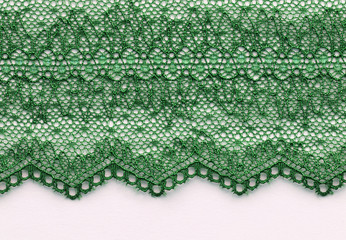 The macro shot of the green lace texture material