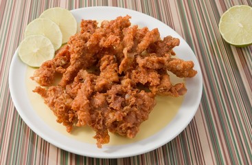 Thai Traditional Fried Chicken Skins on Dish