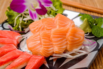 Salmon sashimi Serve with crab Served with wasabi