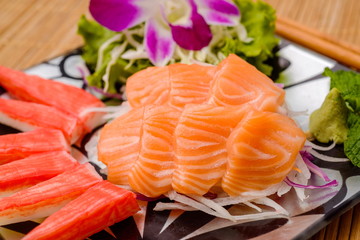 Salmon sashimi Serve with crab Served with wasabi