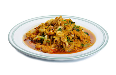 fried squid in yellow curry powder, thai food.