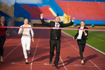 Fototapeta premium business people running on racing track