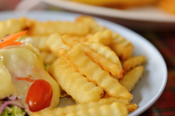 Golden French fries potatoes ready to be eaten