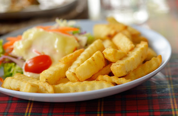Golden French fries potatoes ready to be eaten