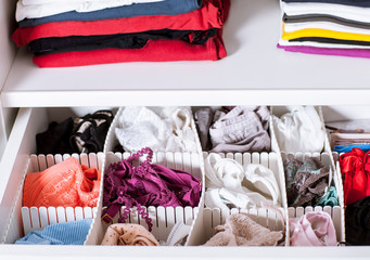 Clothes in a wardrobe