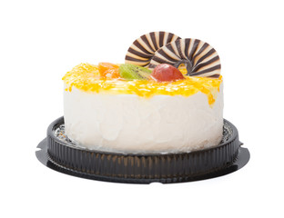 yummy cake on white with grape orange kiwifruit and chocolate on