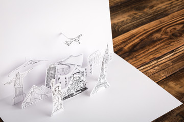 Fototapeta na wymiar Paper cut of travel (Japan,France,Italy,New York,India,egypt)