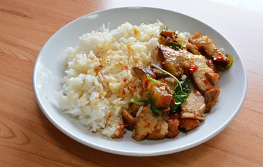 spicy stir fried crispy pork with basil leaf