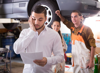 Tired client at auto service