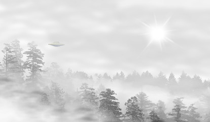 UFO in a landscape of misty forest at sunrise