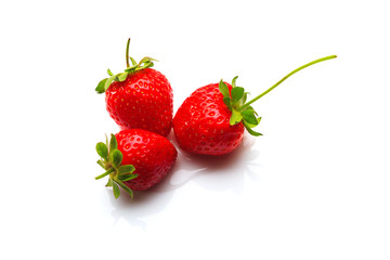Strawberries in water drops isolated on white background