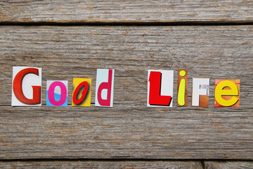 The word Good Life in cut out magazine letters