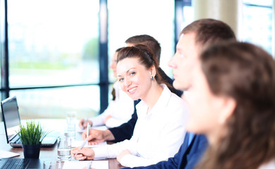 Smiling businesswoman looking at camera 