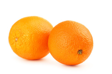 Ripe oranges isolated on white