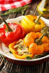 Red and yellow peppers stuffed with meat, rice and vegetables