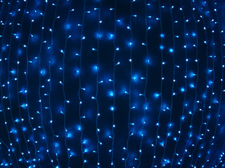 Defocused and blur image of garland of blue led