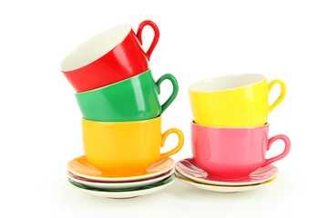 Colorful cups isolated on white