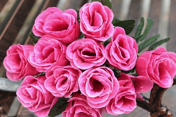 Beautiful vintage roses of artificial flowers