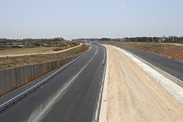 Paving a new road.
Laying of new high-speed roads in Israel.
