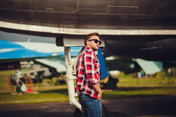 Fototapeta premium Stylish man in sunglasses and a shirt