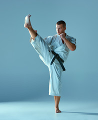 Man in white kimono training karate © master1305