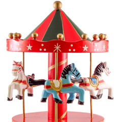 Colored carousel toy with horses, close up, isolated © Negoi Cristian