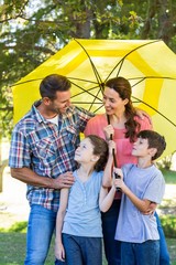 Happy family in the park together