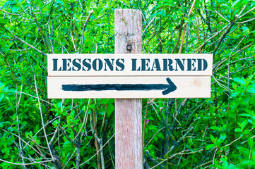 LESSONS LEARNED Directional sign