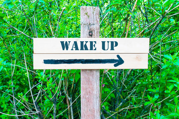 WAKE UP Directional sign