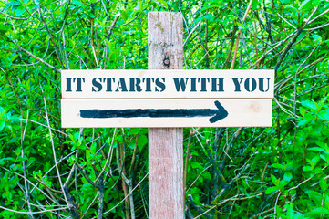 IT STARTS WITH YOU Directional sign