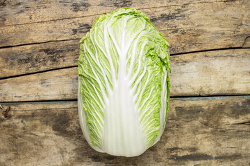 Fresh chinese cabbage on wooden background