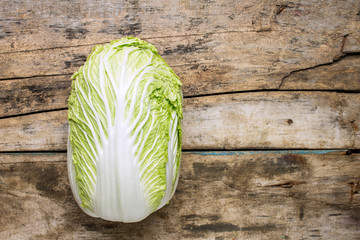 Fresh chinese cabbage on wooden background