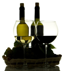 Silhouette of winebottles and grapes in basket