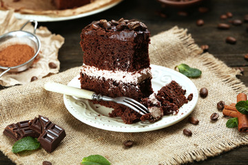 Delicious chocolate cake on table close-up
