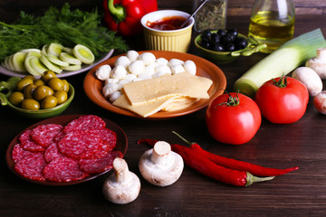 Different products on wooden table close up