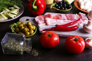 Different products on wooden table close up