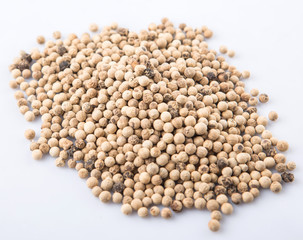 White pepper over white background