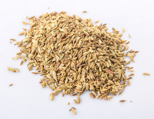 Cumin seed over white background
