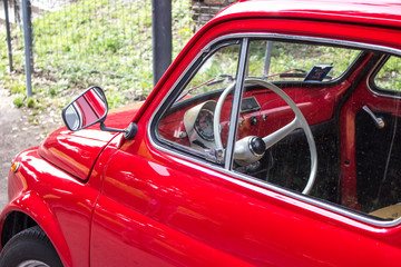 small car / Detail of a small red car