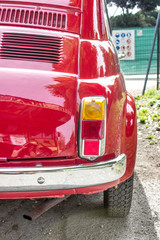 small car / Back of a small red car